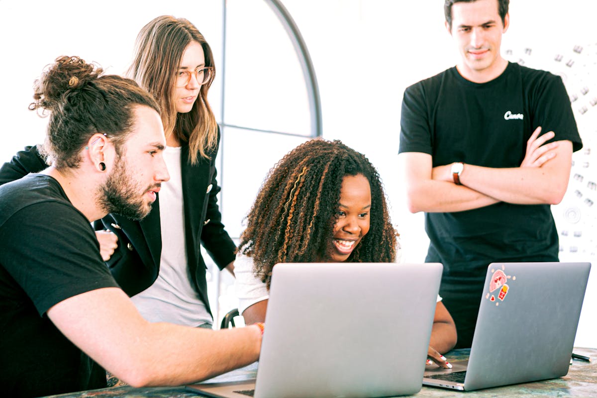 Team collaborating in a bright modern office, symbolizing parallel AI agent workflows